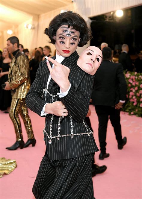 ezra miller met gala dress.